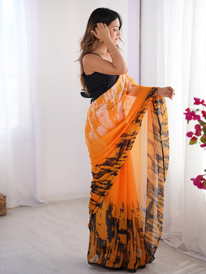Orange & Black Printed Chiffon Saree With Blouse Piece